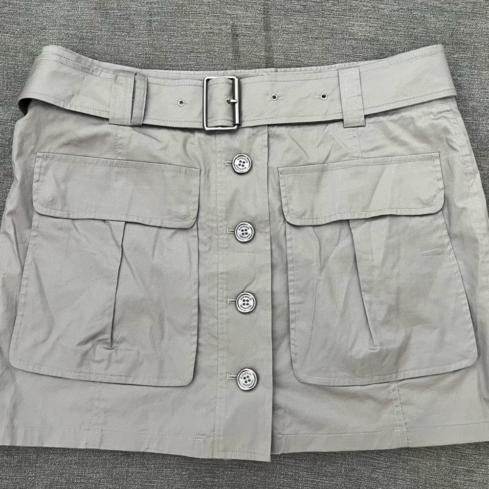 Burberry Brit mini skirt, 2 pockets w/ buttons lining the front